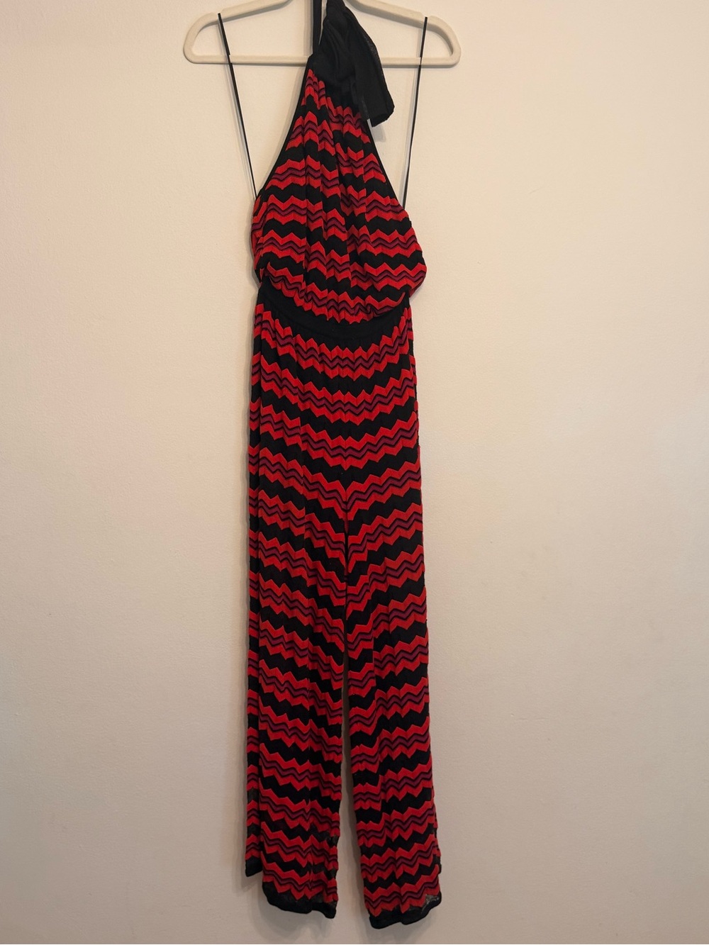 M Missoni
Red chevron stripe knit halter-neck jumpsuit with cutout mid-back